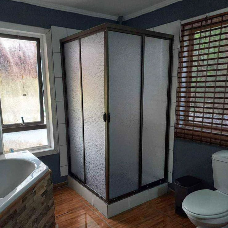 shower door tipo L, puertas de ducha en L, shower door esquina, modelo L para baños, shower door moderno Chile, Cristalven shower doors, puertas para ducha a medida